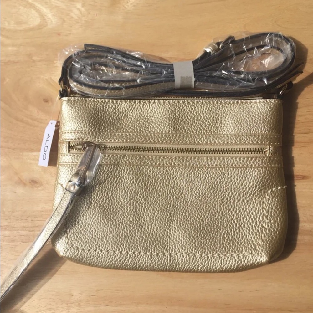 New Aldo small gold purse.